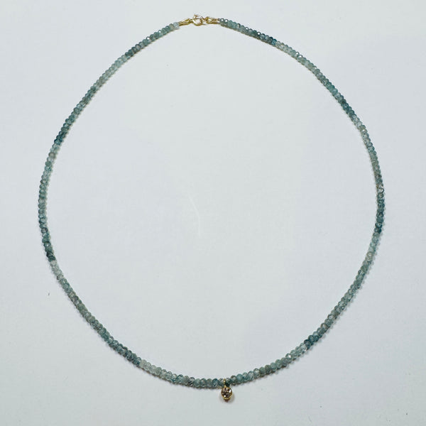 delicate necklace with bezel set diamond