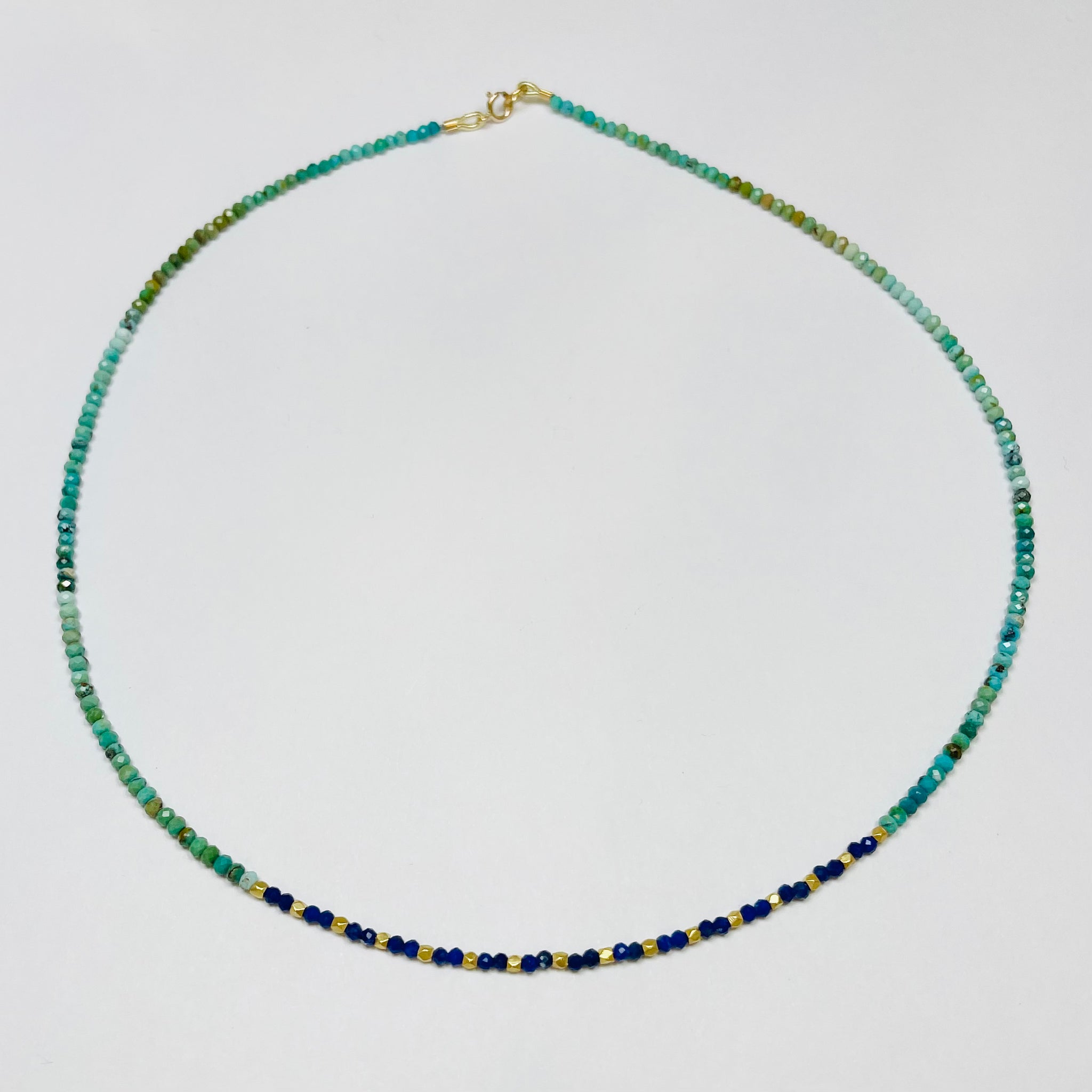 delicate turquoise and lapis necklace with 16 gold nuggets