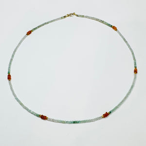 delicate aqua tourmaline necklace with carnelian and gold nuggets