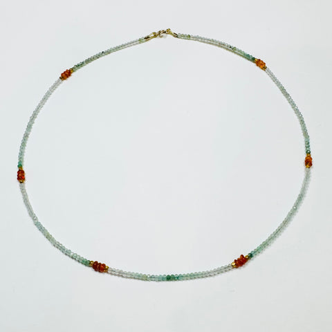 delicate aqua tourmaline necklace with carnelian and gold nuggets