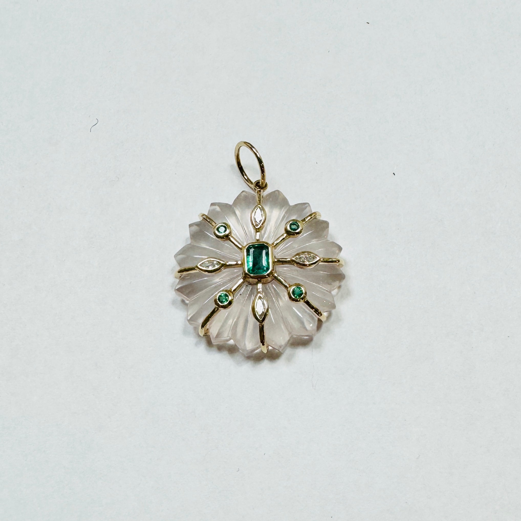 carved clear quartz flower pendant