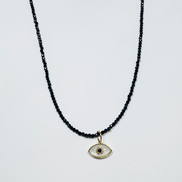 delicate lapis necklace with evil eye charm