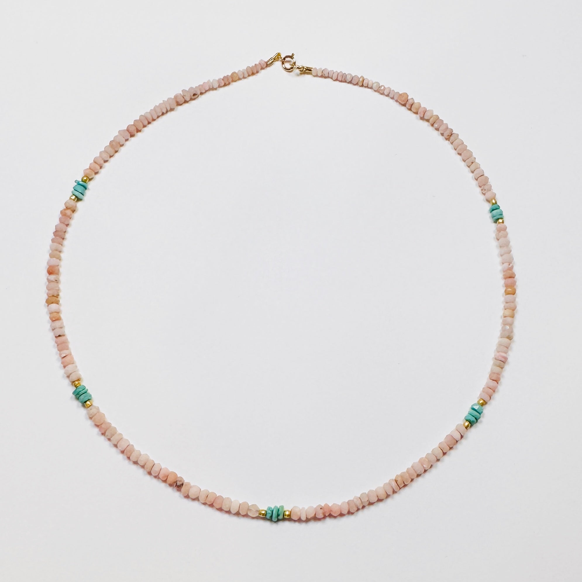 delicate pink opal necklace with turquoise and gold beads