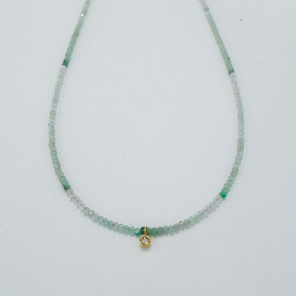 delicate necklace with bezel set diamond
