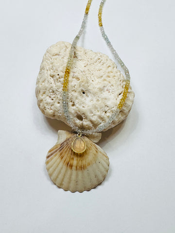 aquamarine necklace with shell pendant