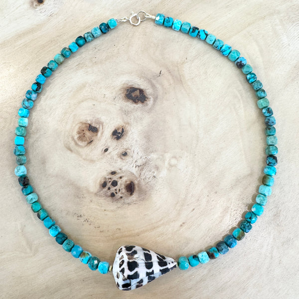 Shell, turquoise, and gold beads