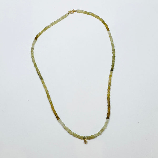 delicate necklace with bezel set diamond