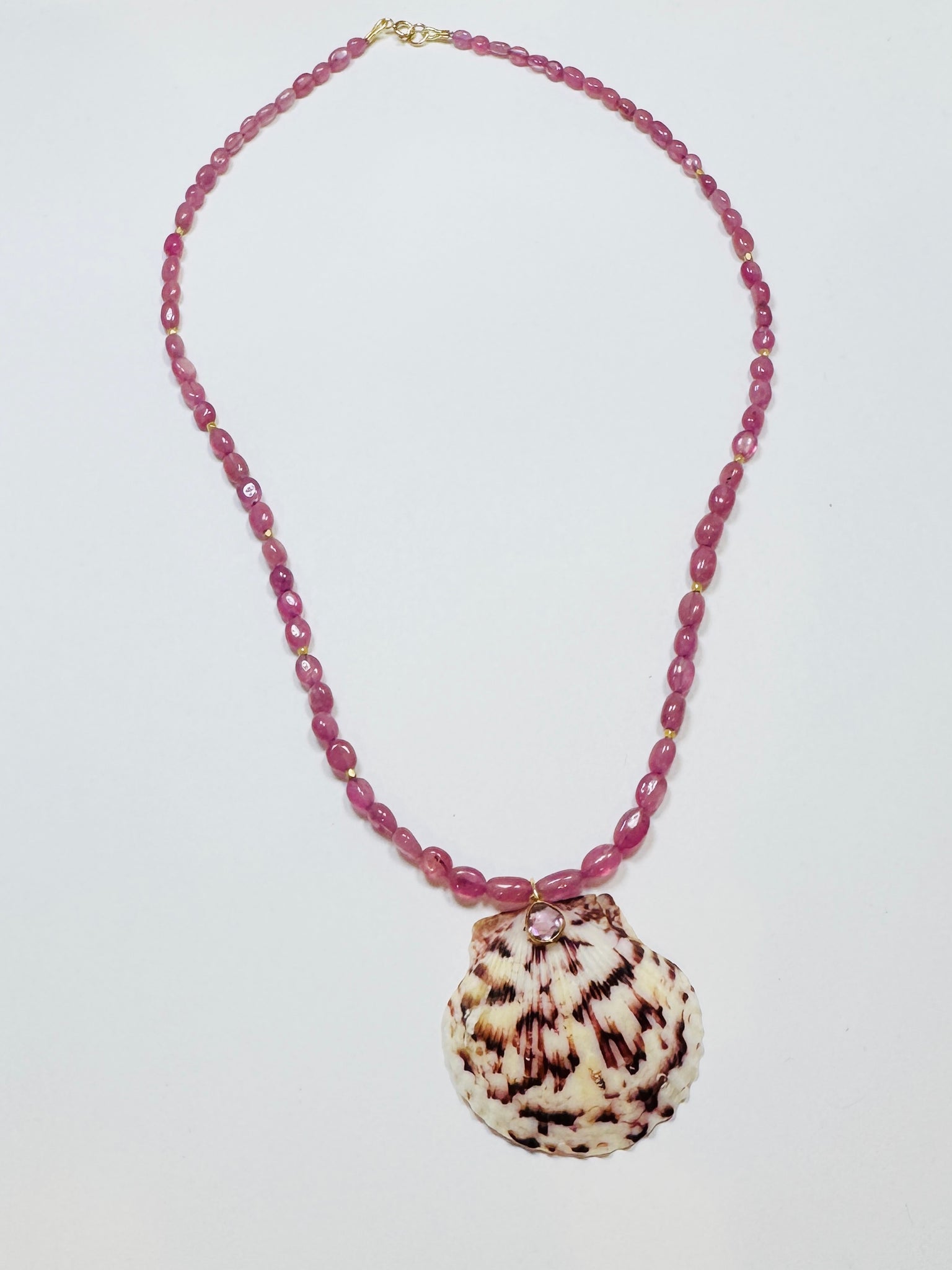 pink sapphire necklace with shell pendant