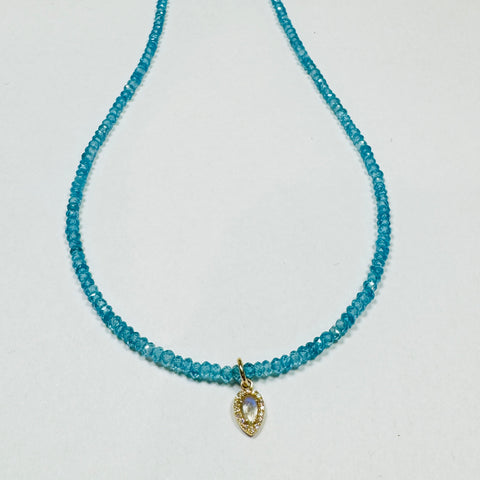 delicate blue appetite necklace with moonstone charm