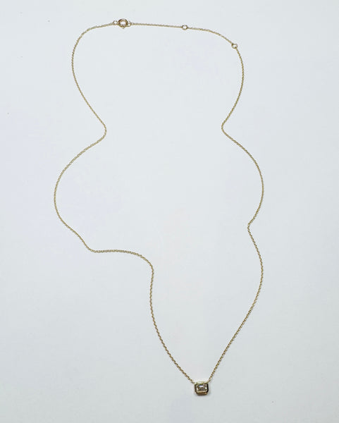 emerald cut diamond on gold chain