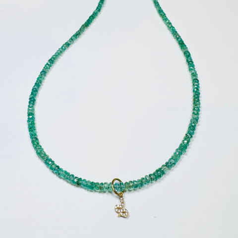 delicate emerald necklace with diamond snake charm