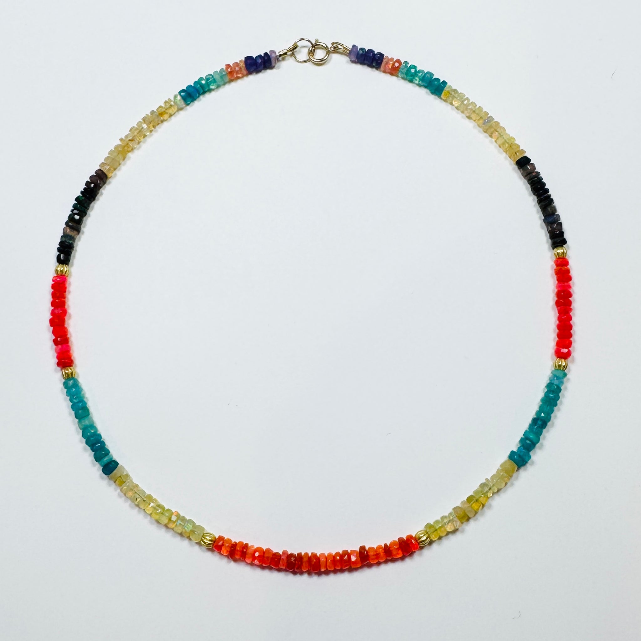 multicolored Ethiopian opal with textured gold beads