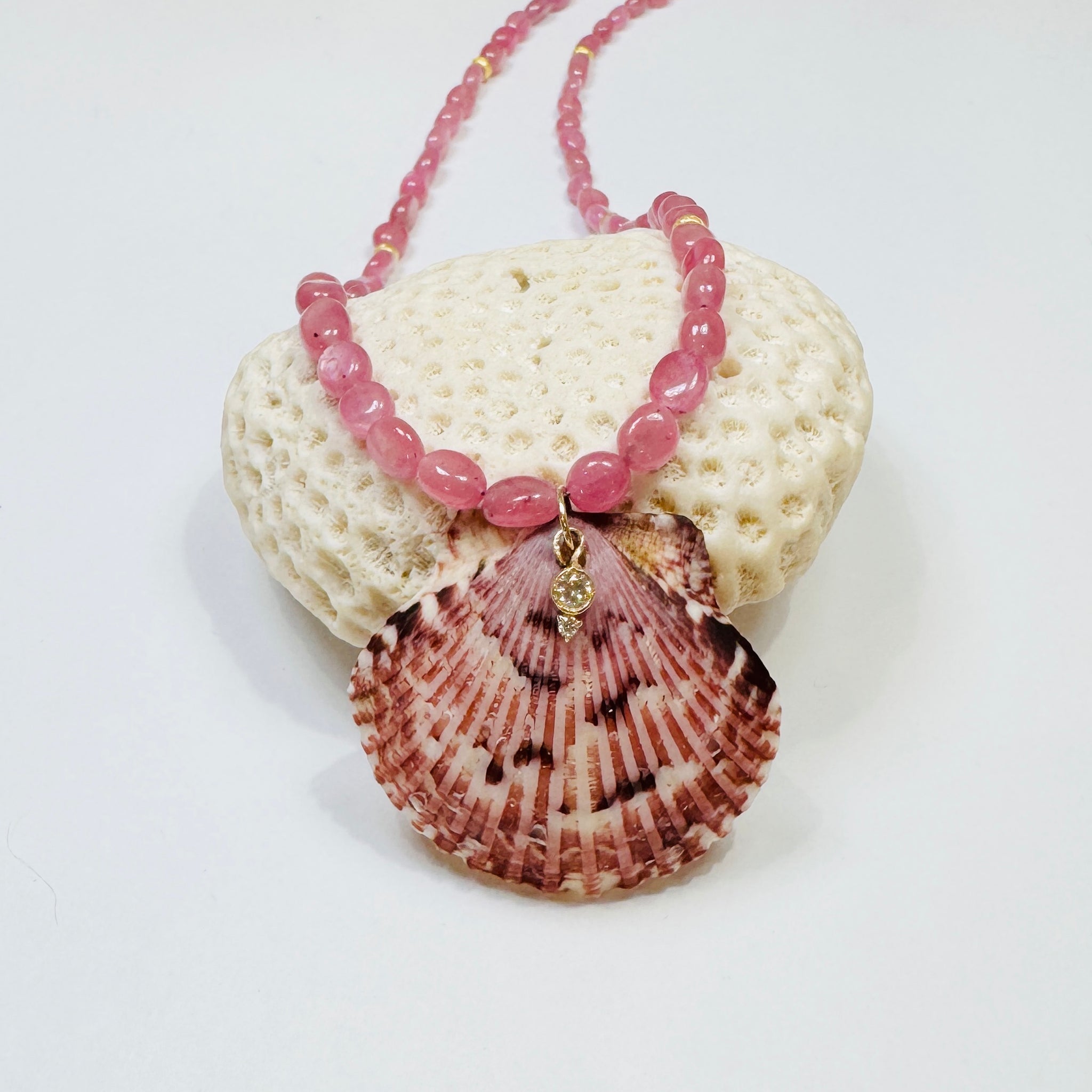 pink sapphire necklace with shell pendant