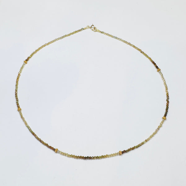 delicate sapphire with 14 k gold beads