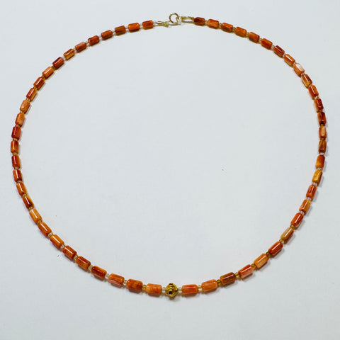 coral tube necklace with diamond bead
