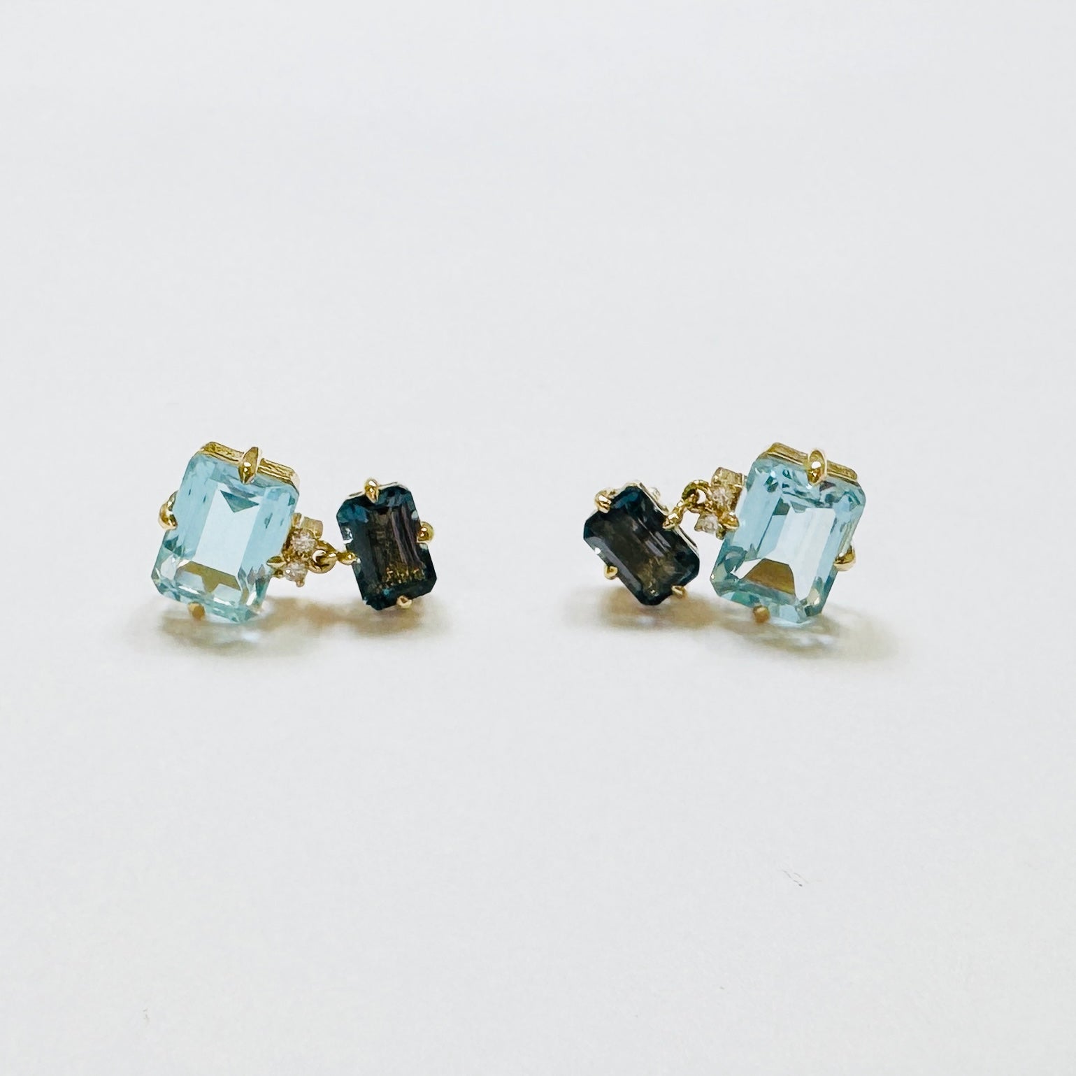 emerald cut blue topaz studs