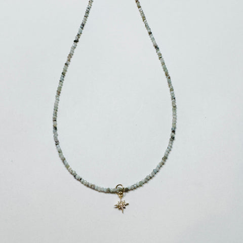 delicate Peruvian blue opal necklace with diamond starburst charm