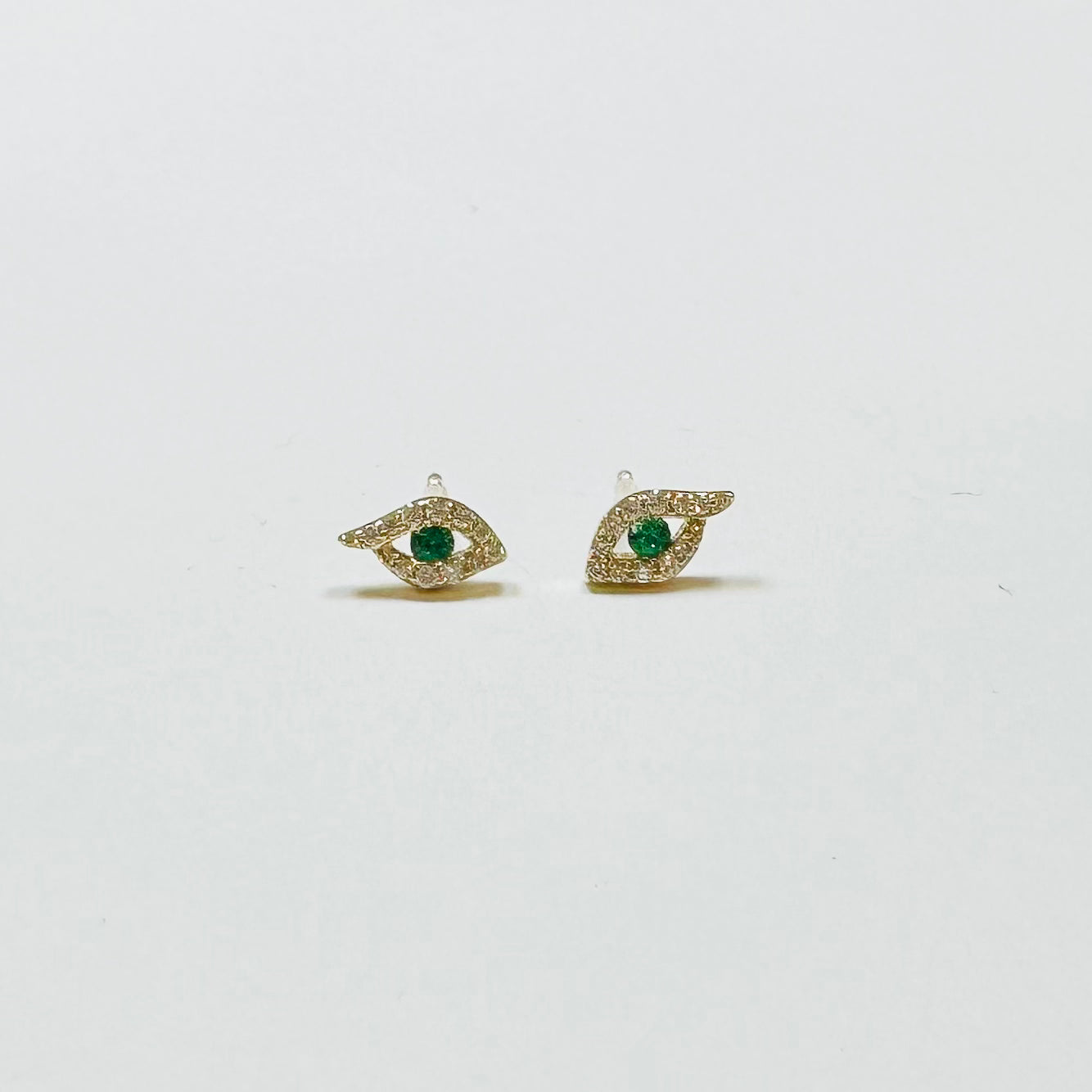 abstract emerald evil eye studs