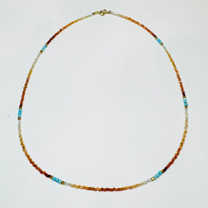 delicate shaded fire opal necklace with turquoise and gold nuggets