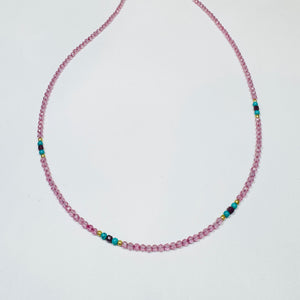 Pink sapphire necklace with turquoise, ruby, and gold nuggets