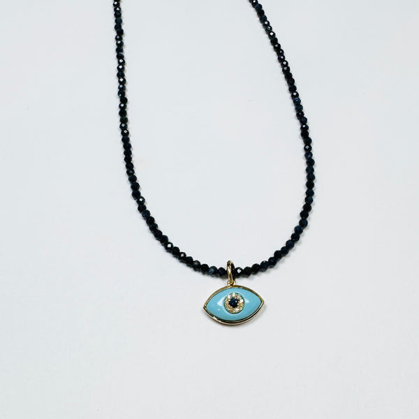 delicate lapis necklace with evil eye charm