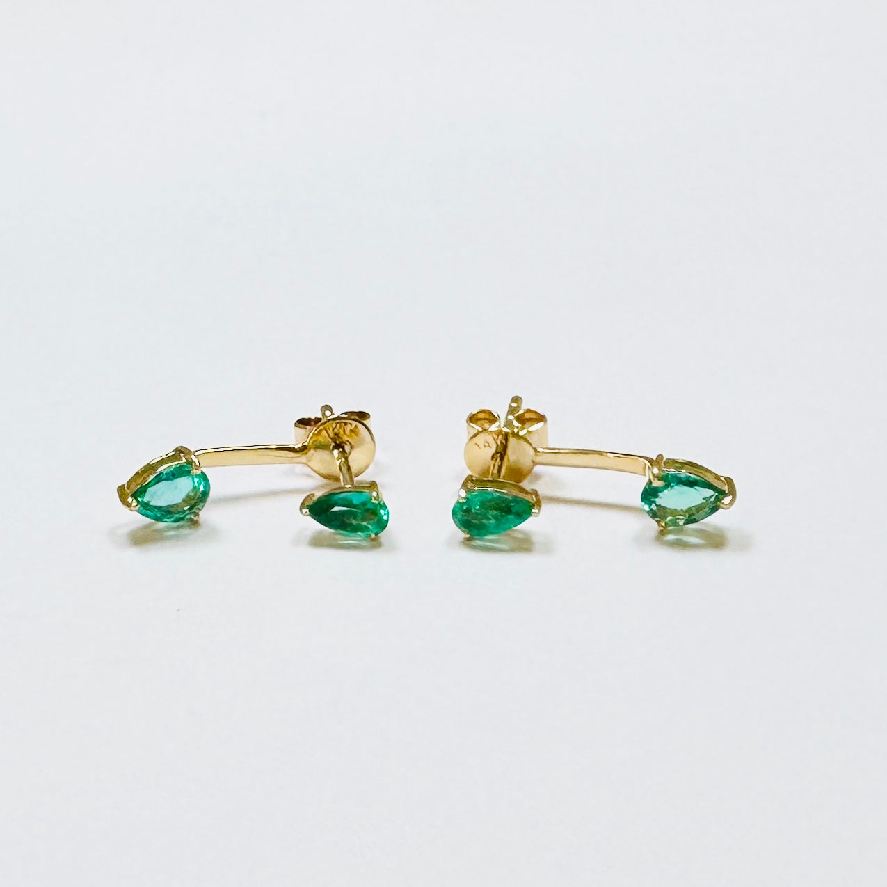 emerald studs with jacket