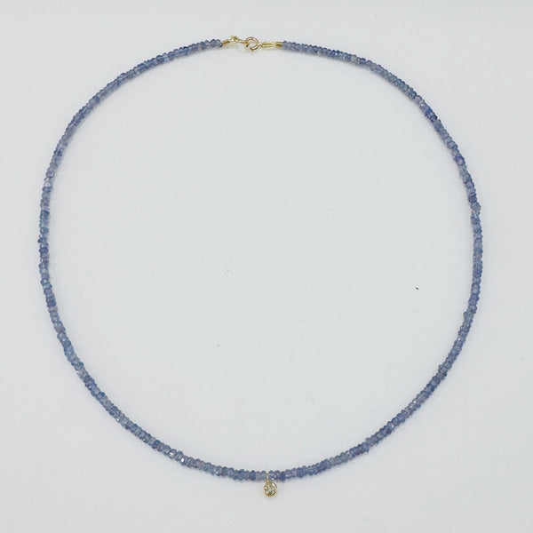 delicate necklace with bezel set diamond