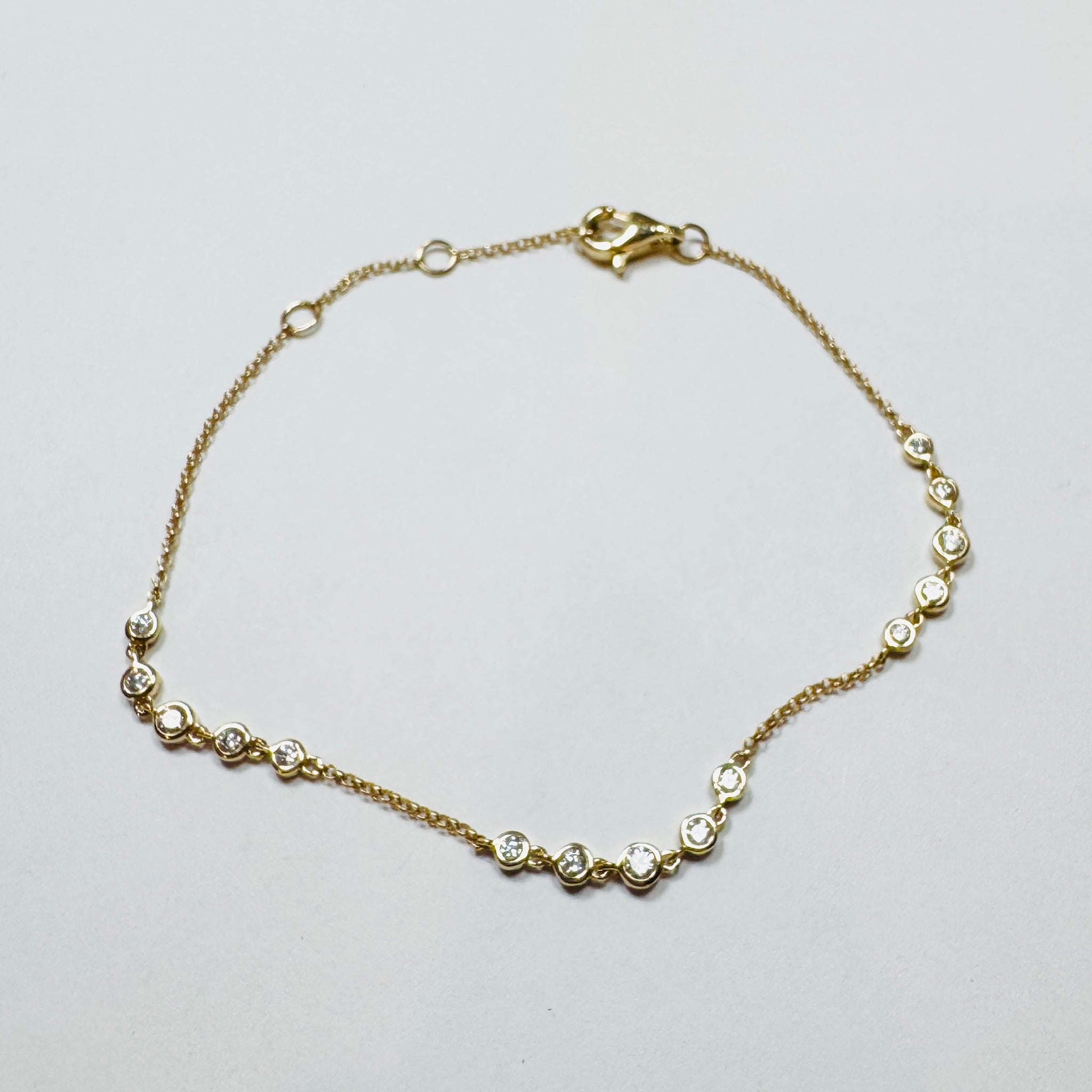 bezel set five diamond station bracelet