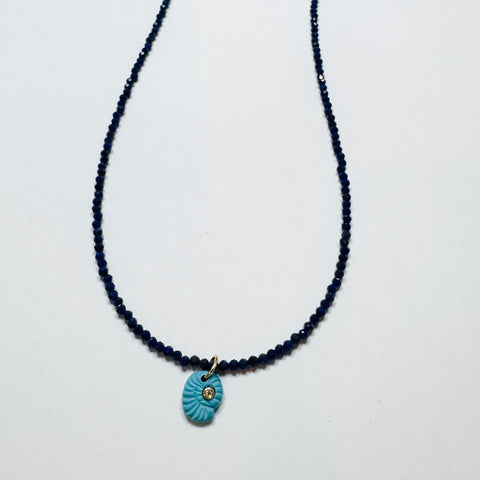 delicate lapis necklace with turquoise Nautilis charm