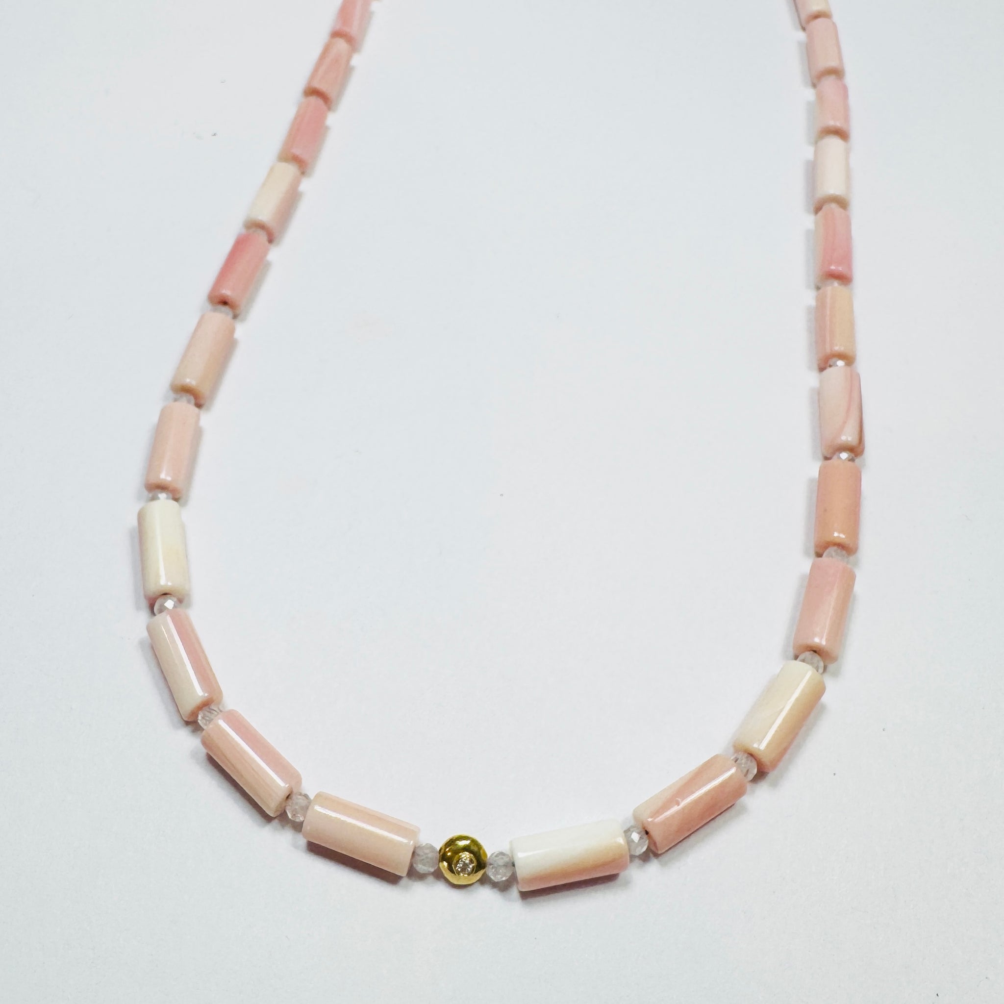 tube pink conch necklace with diamond bead