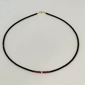 delicate onyx necklace with ruby cubes and center gold nugget