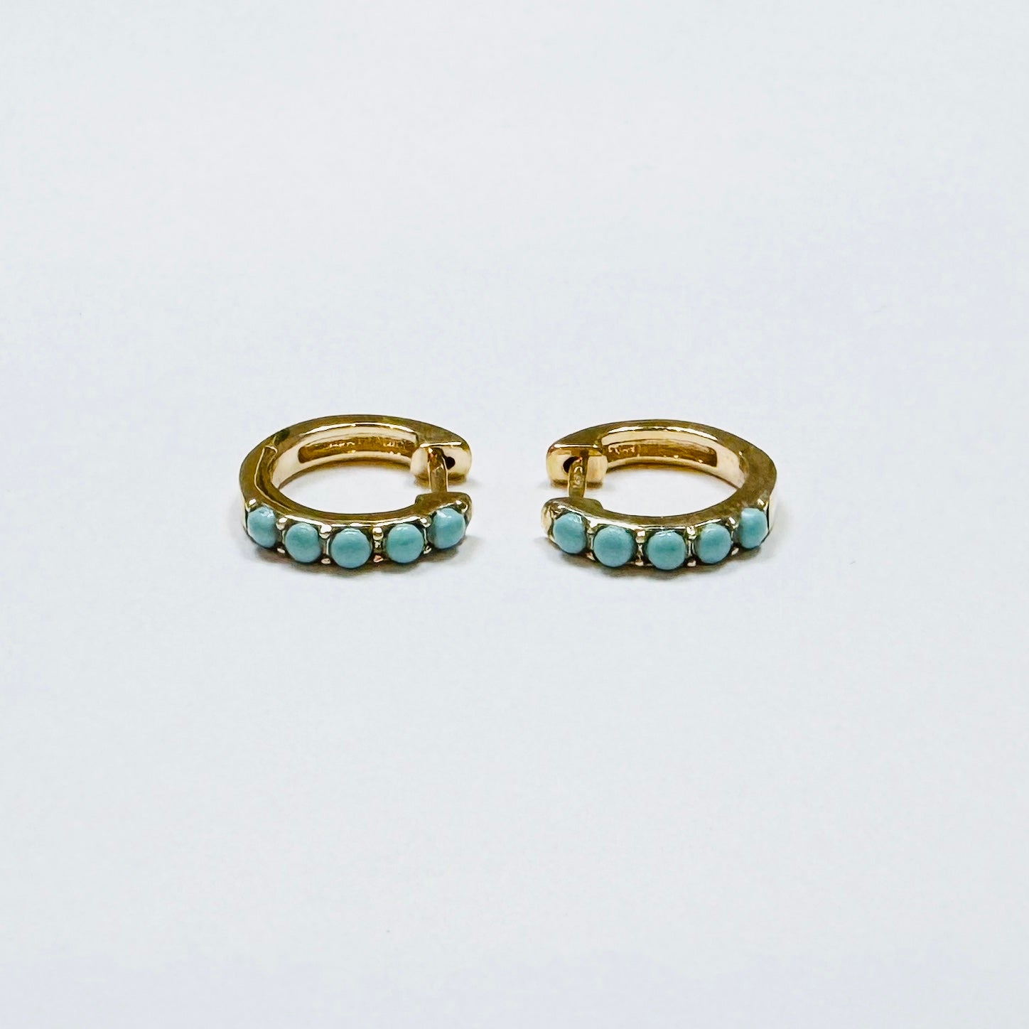 turquoise studded gold huggies