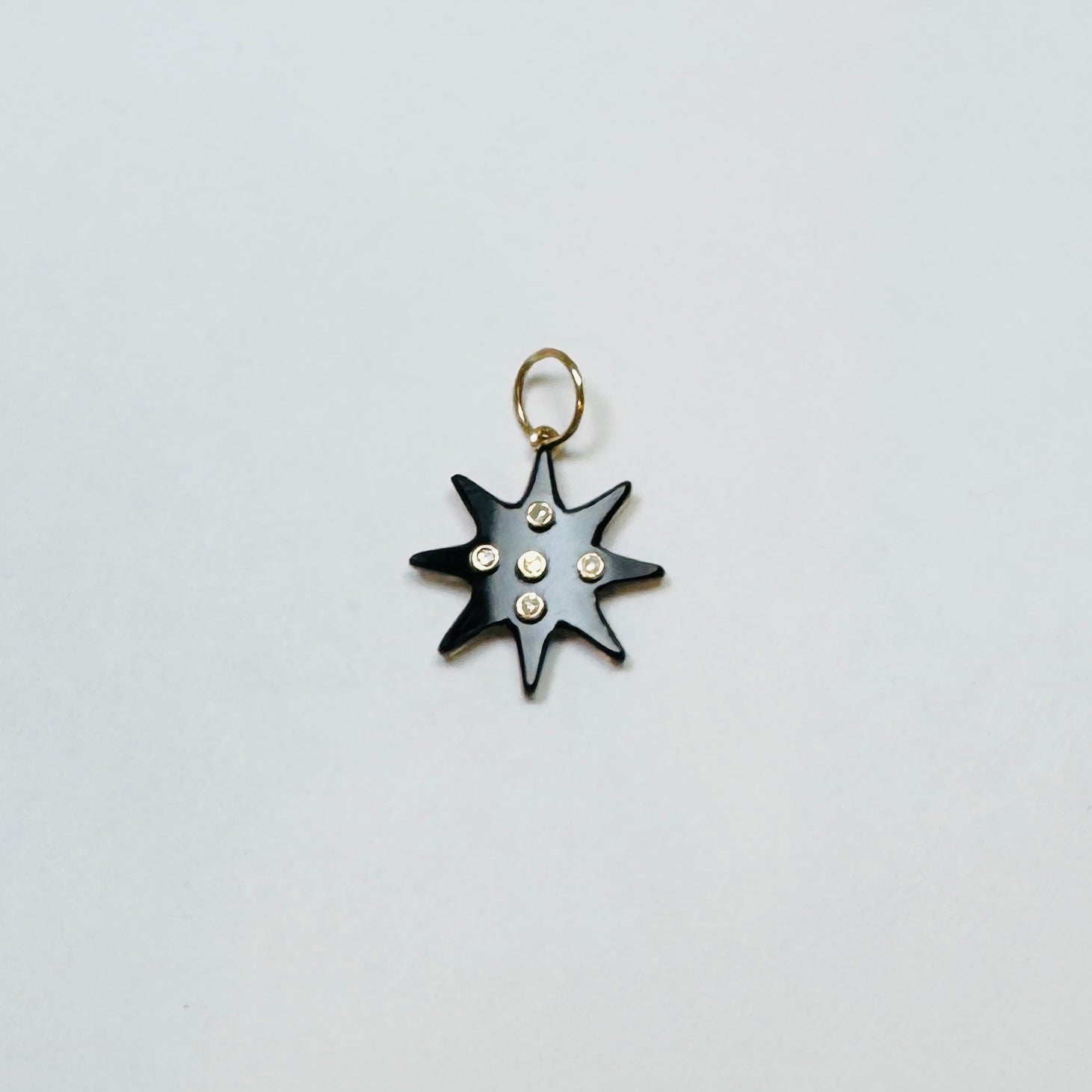 onyx starburst pendant