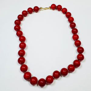 knotted red coral gumball