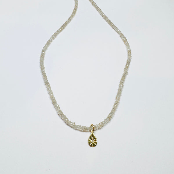 gemstone chain with diamond and gold teardrop