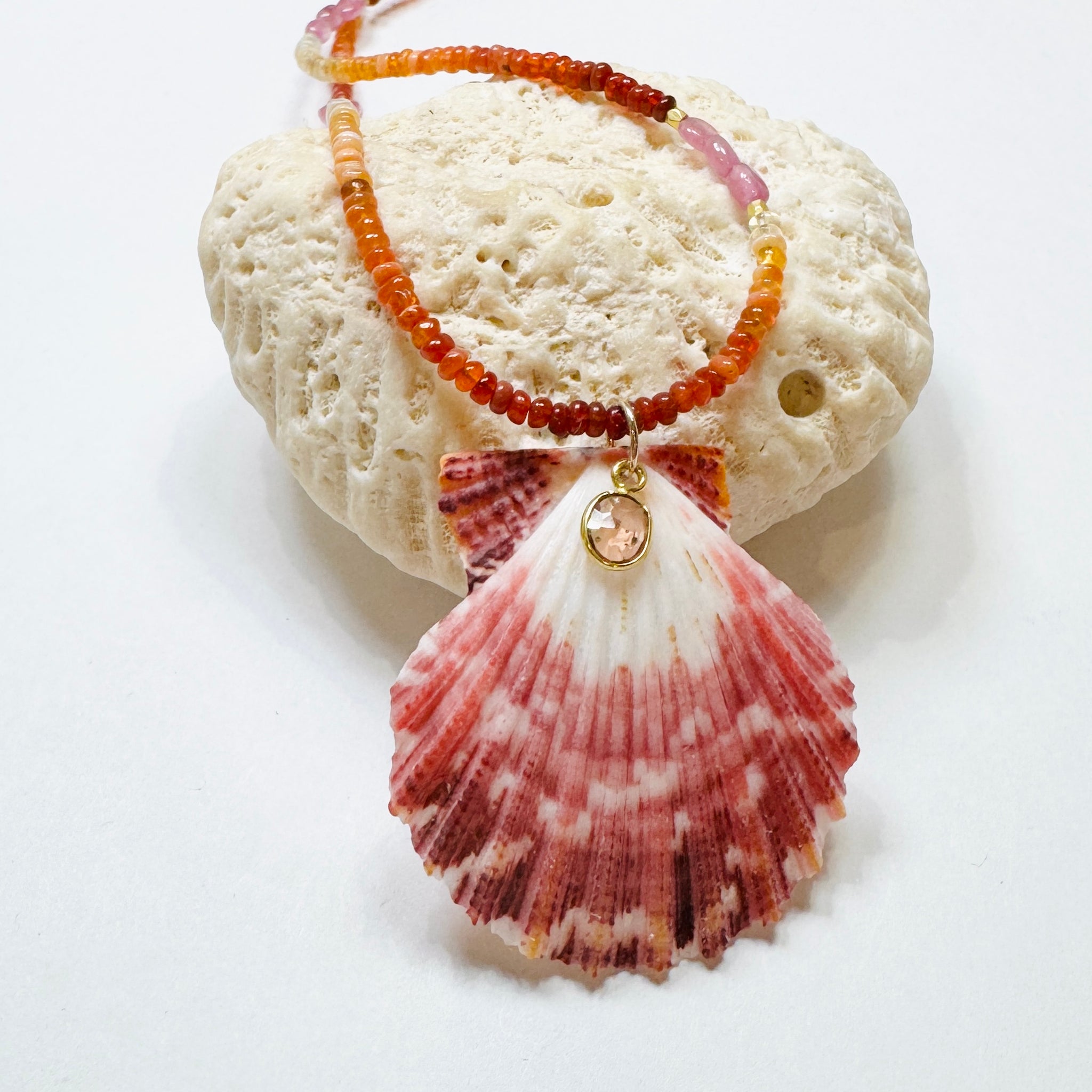 fire opal and pink sapphire necklace with shell pendant