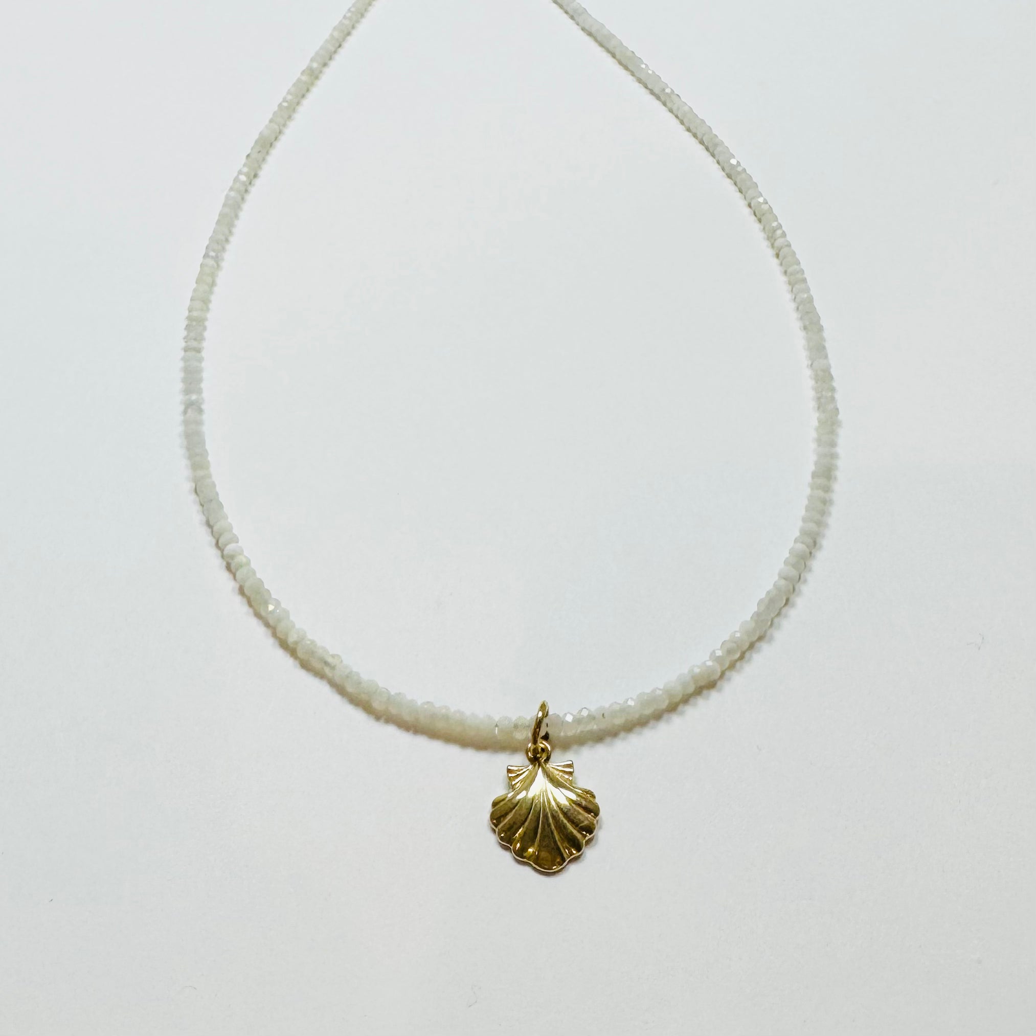 delicate moonstone necklace with shell