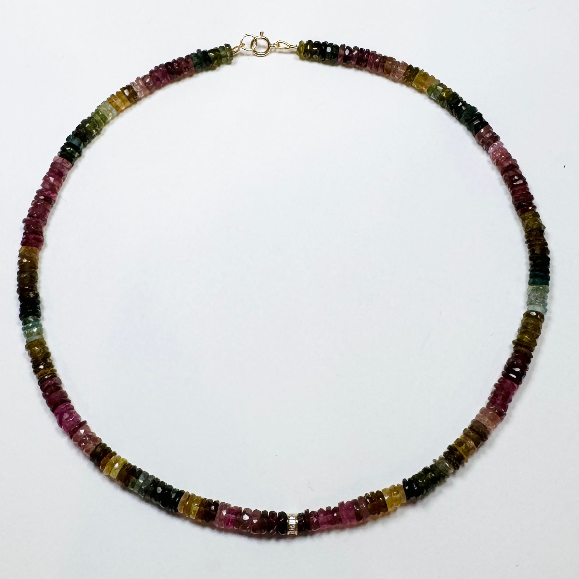 faceted tourmaline with diamond barrel