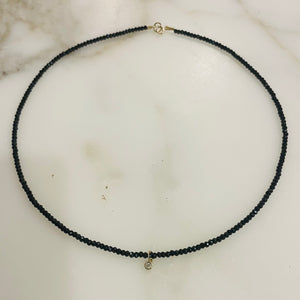 delicate black onyx necklace with bezel diamond charm