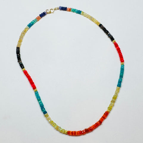 multicolored Ethiopian opal with gold beads