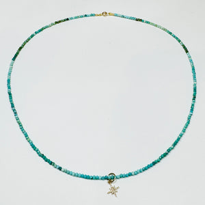 delicate turquoise necklace with diamond starburst charm