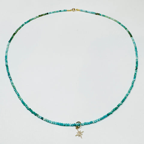 delicate turquoise necklace with diamond starburst charm