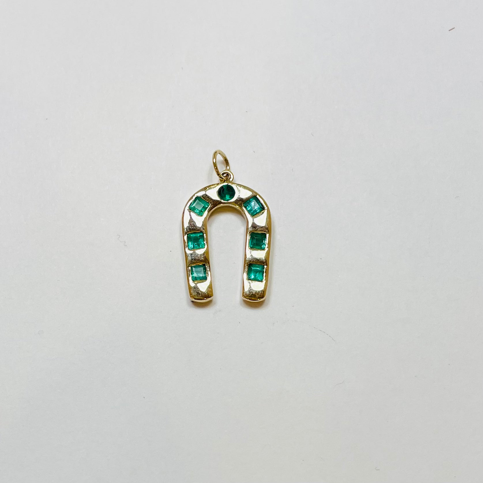 emerald horseshoe pendant, 1 inch