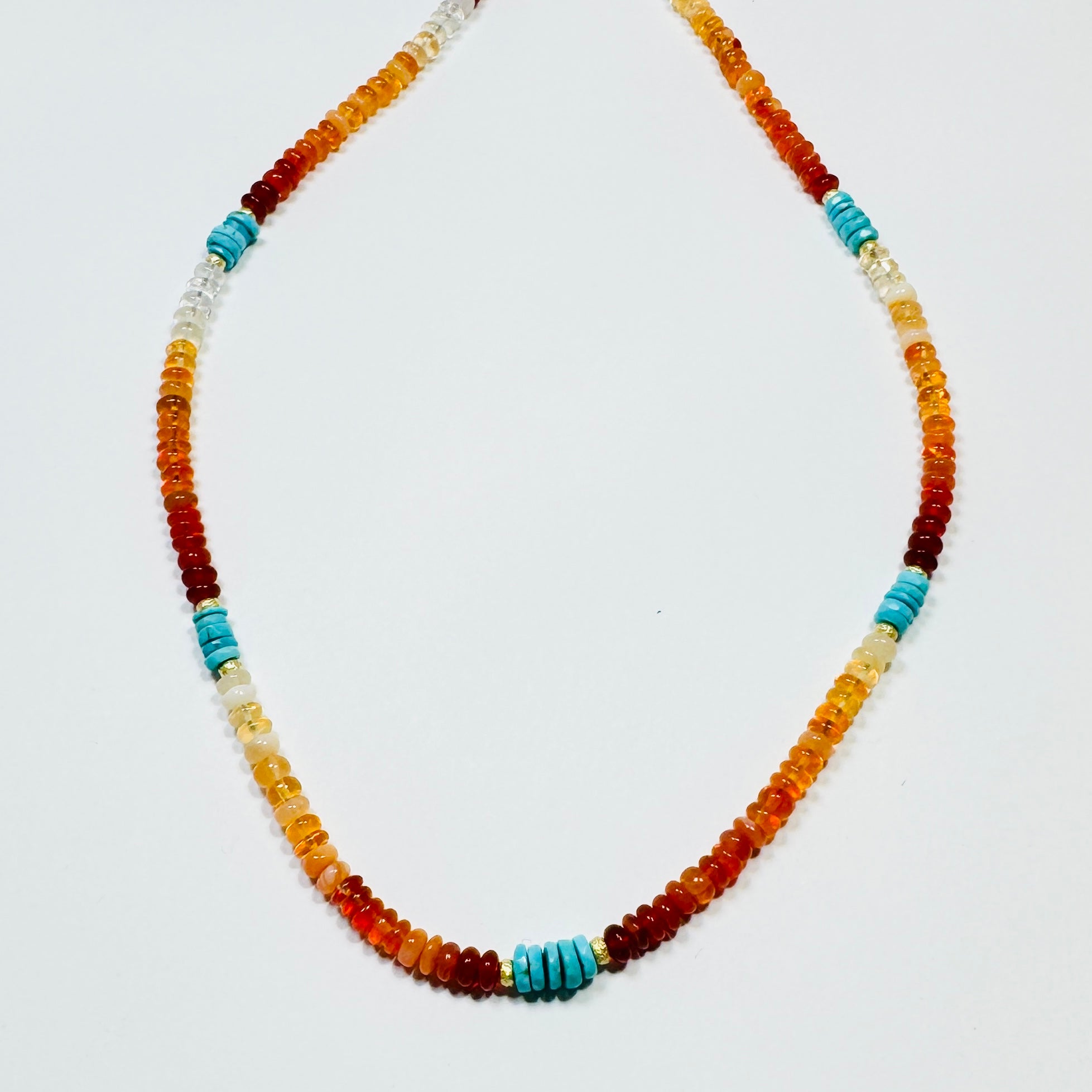 delicate shaded fire opal necklace with turquoise and gold nuggets