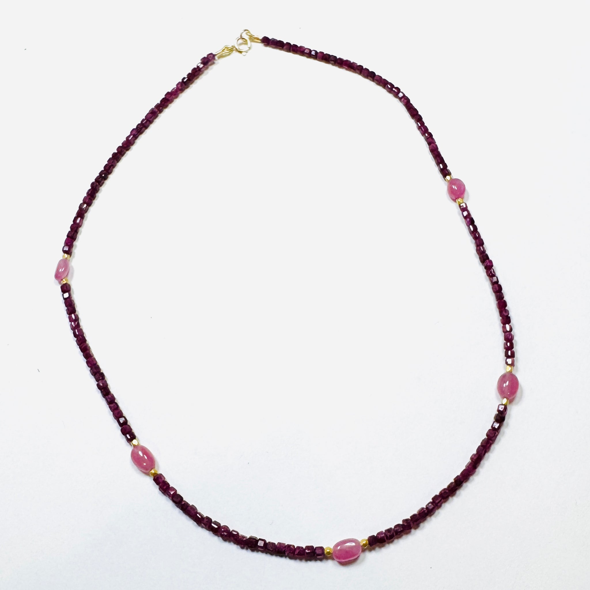 delicate with ruby block, pink sapphire, and gold beads