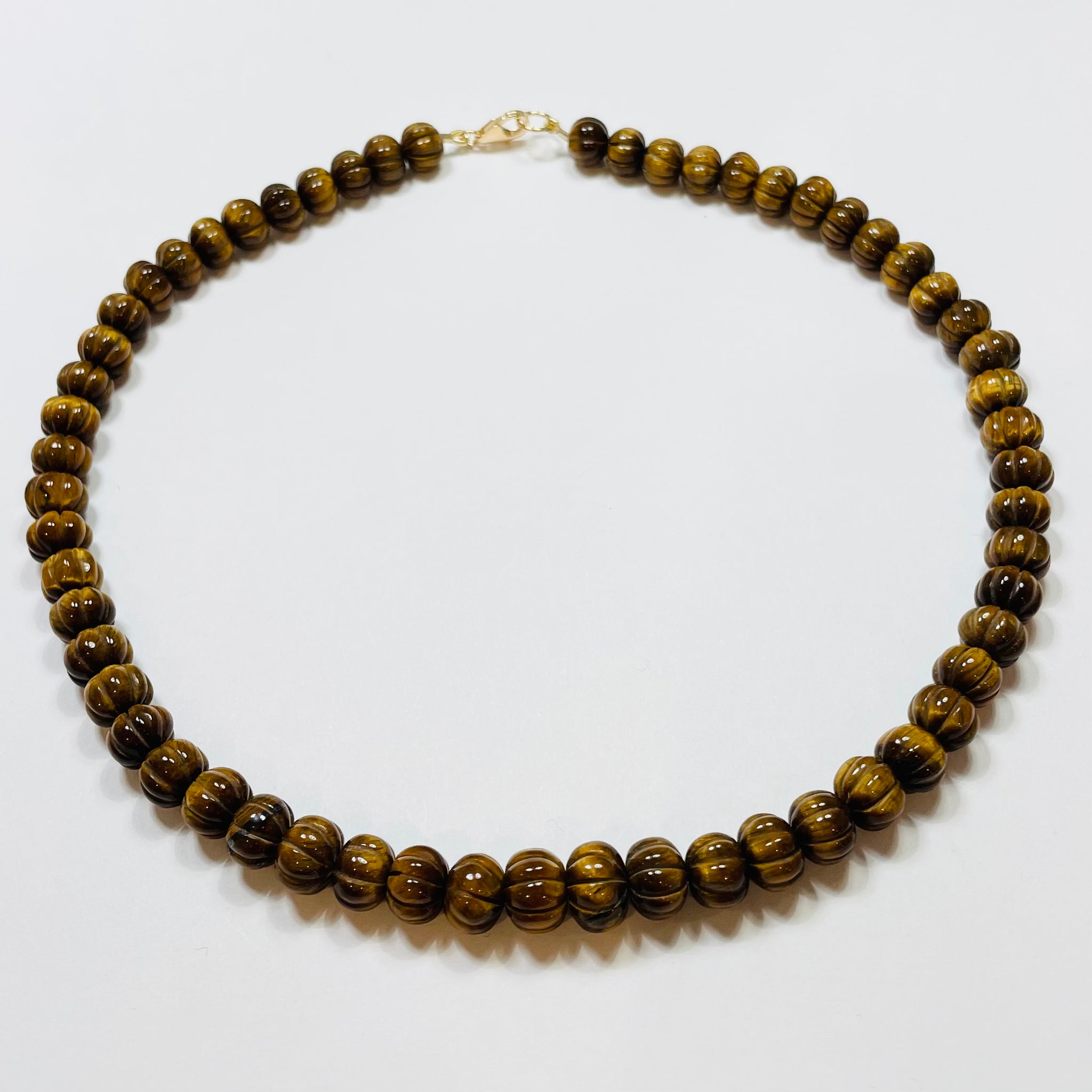 carved tigers eye candy necklace