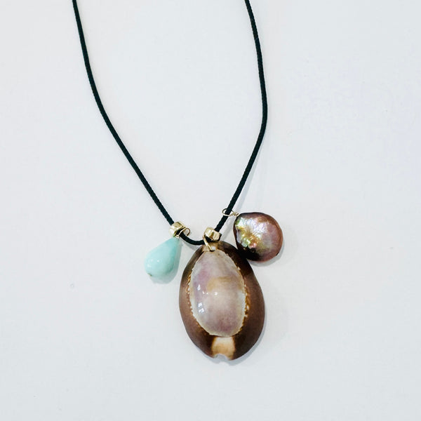 Kumihimo silk cord charm necklace, teal with blue opal, pearl, and purple cowrie shell