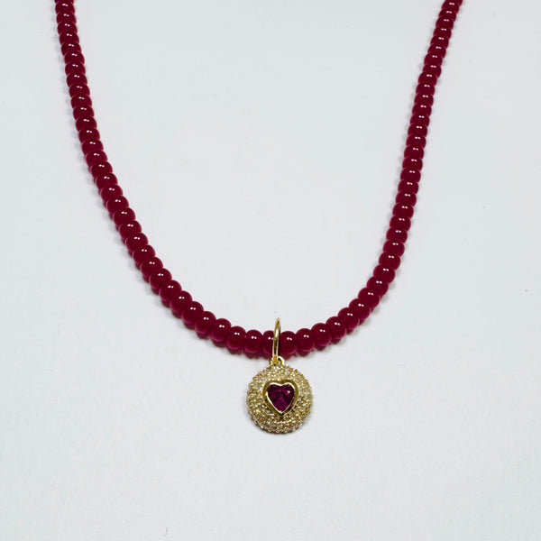 delicate smooth ruby necklace with dome heart charm