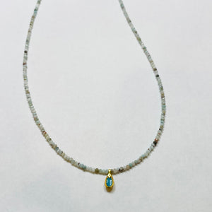 delicate Peruvian blue opal necklace with turquoise charm