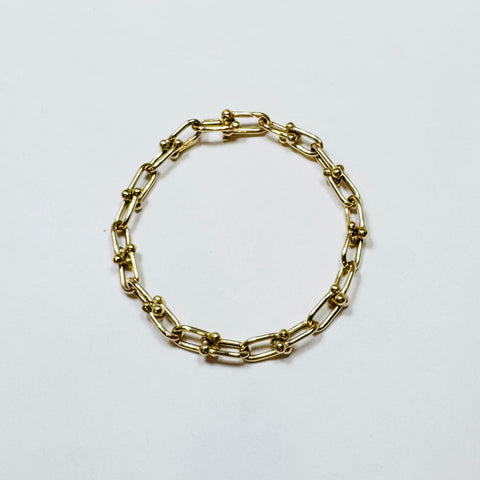 gold horse bit bracelet